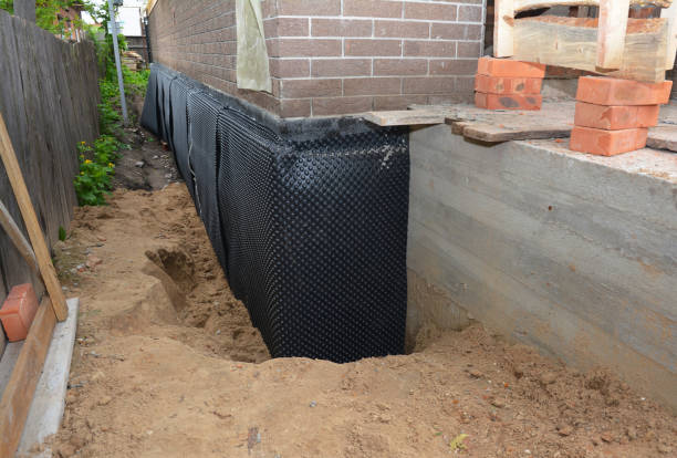 Happy homeowners after waterproofing job in East Rutherford